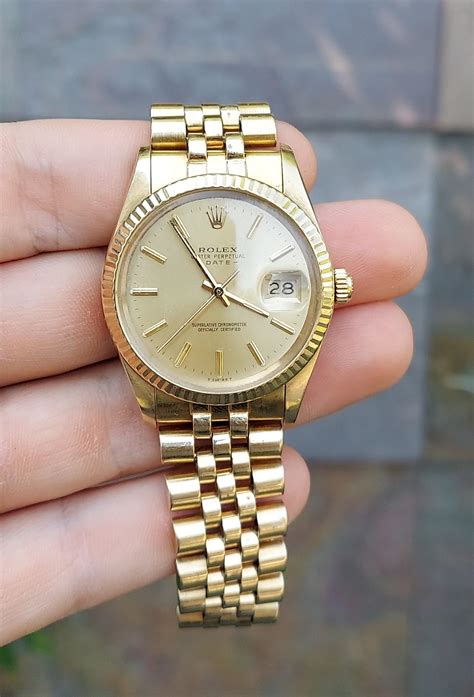 14k gold rolex watch.